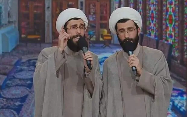 Twin Clerics on Television: 20 Children Means 20 Ration Cards and 20 Subsidies